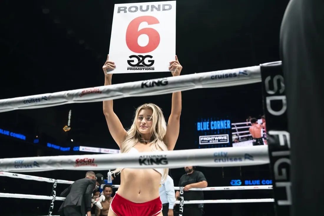 Round card girl signals the round at SD Fight Night